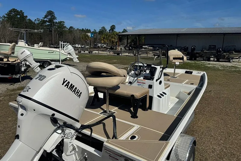 Slide: The Image of 2026 G3 Bay 17 boat with Yamaha engine, parked outdoors on a sunny day. - 4