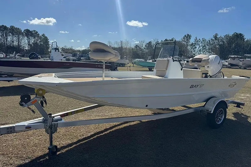 Slide: The Image of 2026 G3 Bay 17 boat on trailer, parked outdoors under clear sky. - 9