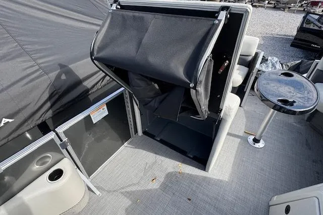 Slide: The Image of 2026 Sylvan 822 Mirage Cruise interior with seating and table, showcasing modern design. - 14