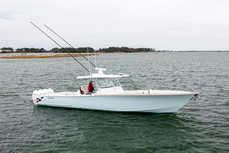 Slide: The Image of 2023 Valhalla Boatworks V-41 cruising on open water, showcasing sleek design and powerful engines. - 4