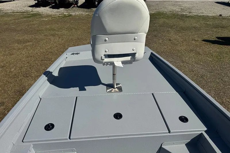 Slide: The Image of 2026 G3 Bay 17 boat interior with white seat and storage compartments. - 12