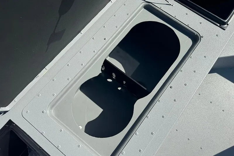 Slide: The Image of G3 Bay 17 boat detail, 2026 model, featuring a dual cup holder. - 13