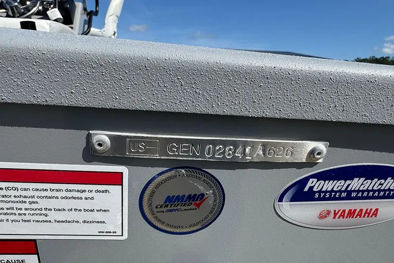 Slide: The Image of Boat identification plate on G3 Bay 17, 2026 model, with safety and warranty stickers. - 24