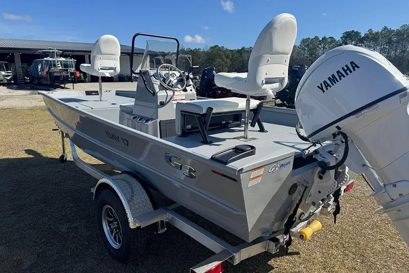 Slide: The Image of 2026 G3 Bay 17 boat with Yamaha motor on trailer, parked outdoors. - 5