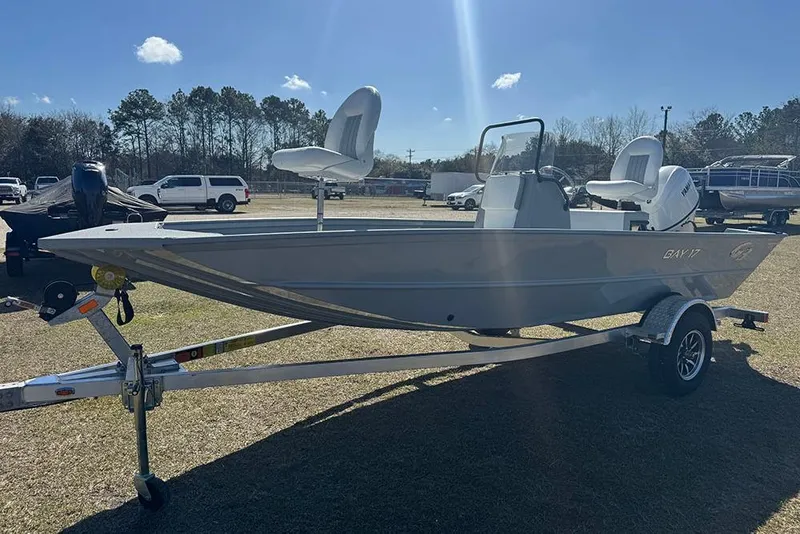 Slide: The Image of 2026 G3 Bay 17 boat on trailer under clear blue sky. - 7