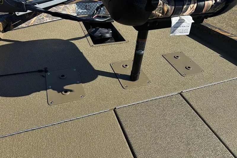 Slide: The Image of 2026 G3 Sportsman 1710 boat deck with mounted seat and storage compartments. - 17