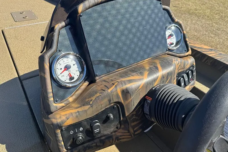 Slide: The Image of Dashboard of 2026 G3 Sportsman 1710 boat with gauges and controls. - 26