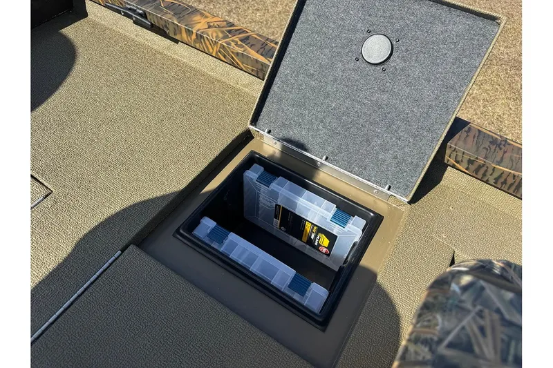 Slide: The Image of Storage compartment on 2026 G3 Sportsman 1710 boat with organized tackle boxes. - 30