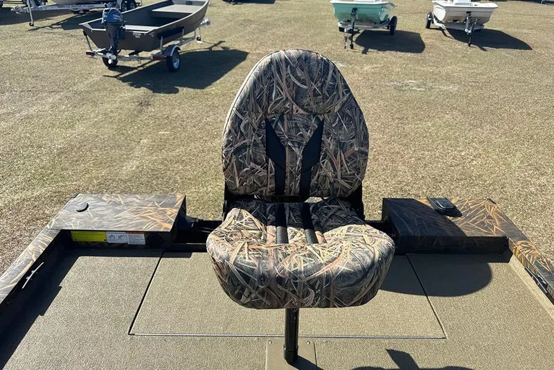 Slide: The Image of 2026 G3 Sportsman 1710 boat seat with camouflage pattern on a sunny day. - 31