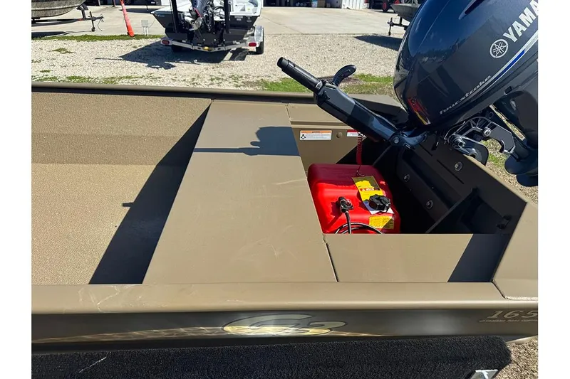 Slide: The Image of 2026 G3 Gator Tough 1652 VBW boat with Yamaha outboard motor and red fuel tank. - 12