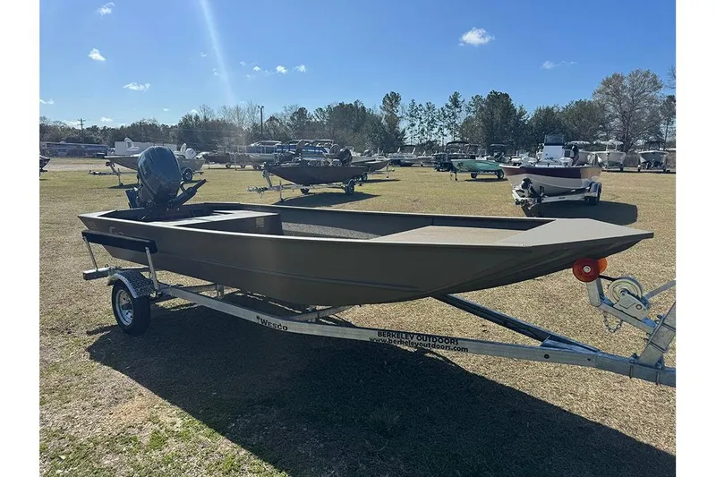 Slide: The Image of 2026 G3 Gator Tough 1652 VBW boat on trailer in outdoor lot. - 8