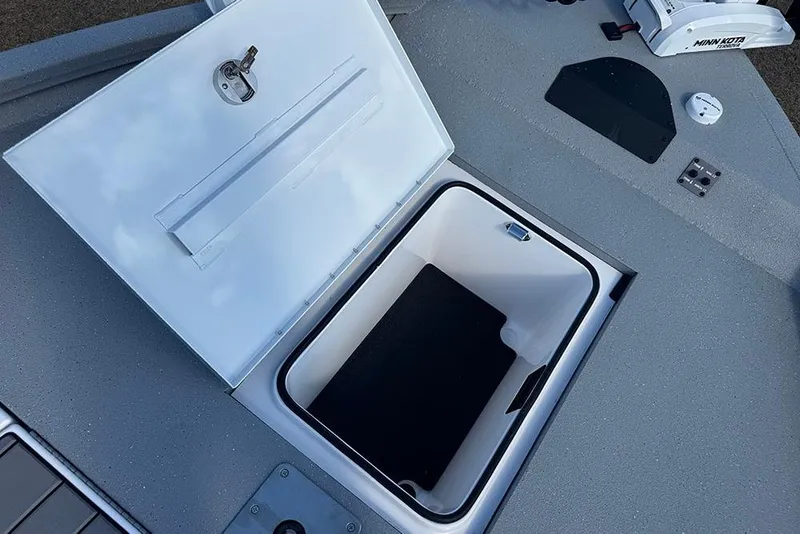 Slide: The Image of Open storage compartment on 2026 Vexus ACX 2210 boat deck. - 19