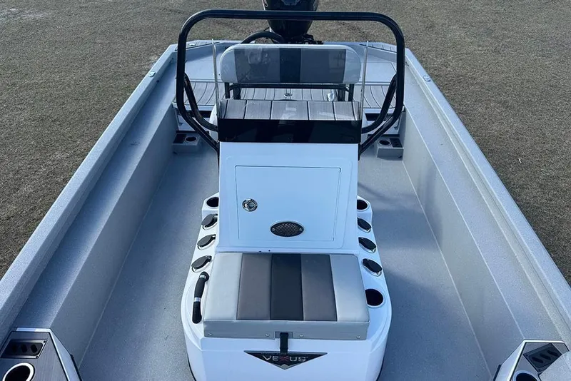 Slide: The Image of 2026 Vexus ACX 2210 boat interior with console and seating, showcasing modern design. - 25