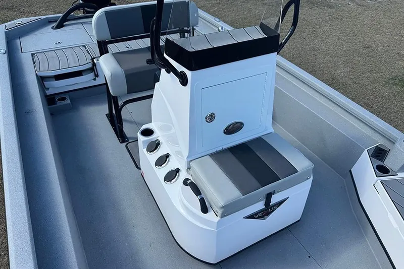 Slide: The Image of 2026 Vexus ACX 2210 boat interior with seating and console, showcasing modern design. - 26