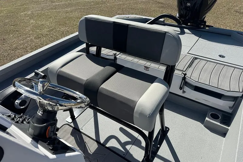 Slide: The Image of 2026 Vexus ACX 2210 boat interior with steering wheel and seating. - 31