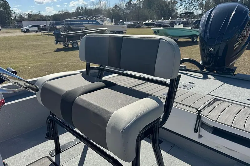 Slide: The Image of 2026 Vexus ACX 2210 boat interior with dual seating and outboard motor. - 36