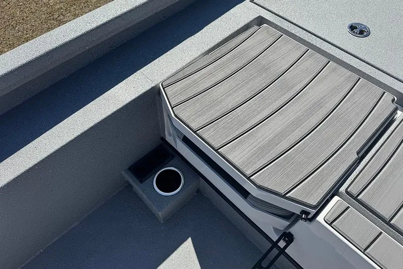 Slide: The Image of 2026 Vexus ACX 2210 boat deck with sleek gray finish and cup holder. - 41