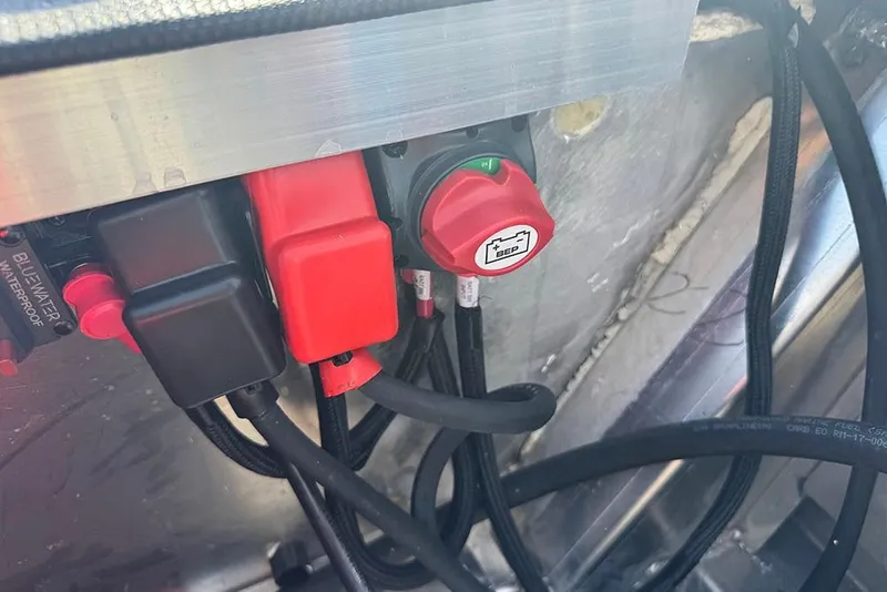 Slide: The Image of Electrical components and wiring in a 2026 Vexus ACX 2210 boat. - 44