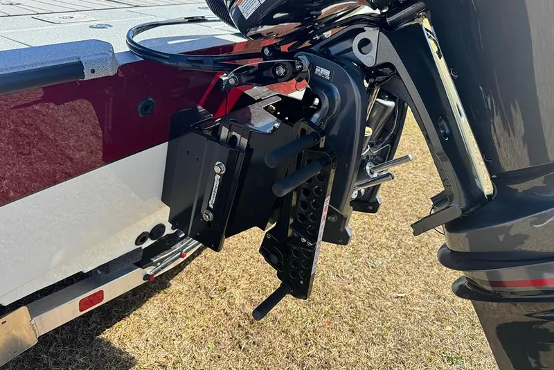 Slide: The Image of 2026 Vexus ACX 2210 boat motor mount detail on grass. - 6