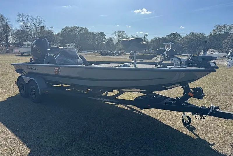 Slide: The Image of 2026 Vexus AVX 2080 boat on trailer, parked outdoors under clear sky. - 10