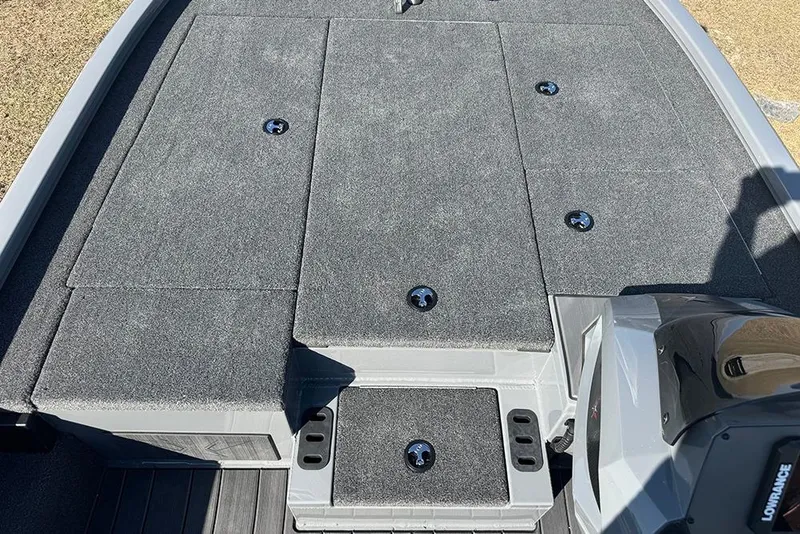 Slide: The Image of 2026 Vexus AVX 2080 boat deck with gray carpet and storage compartments. - 13