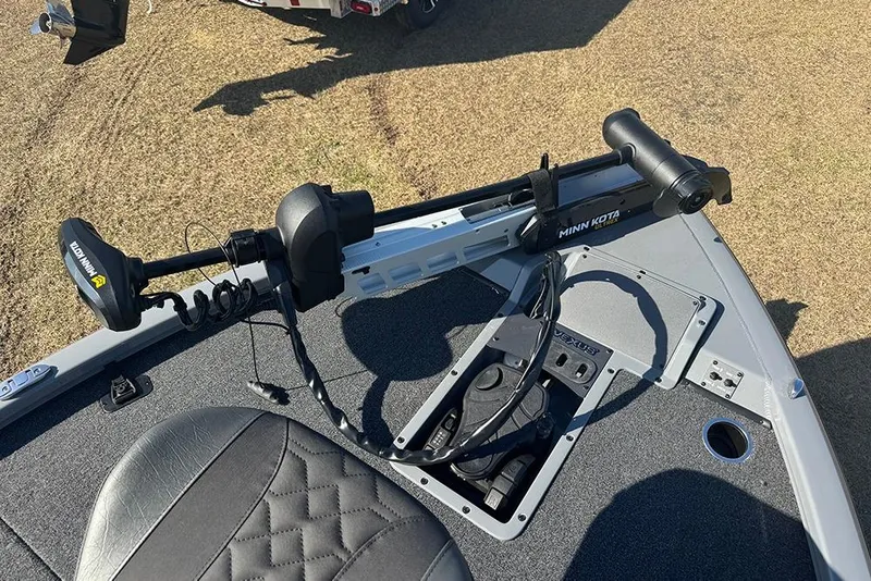 Slide: The Image of 2026 Vexus AVX 2080 boat with Minn Kota trolling motor on deck. - 18