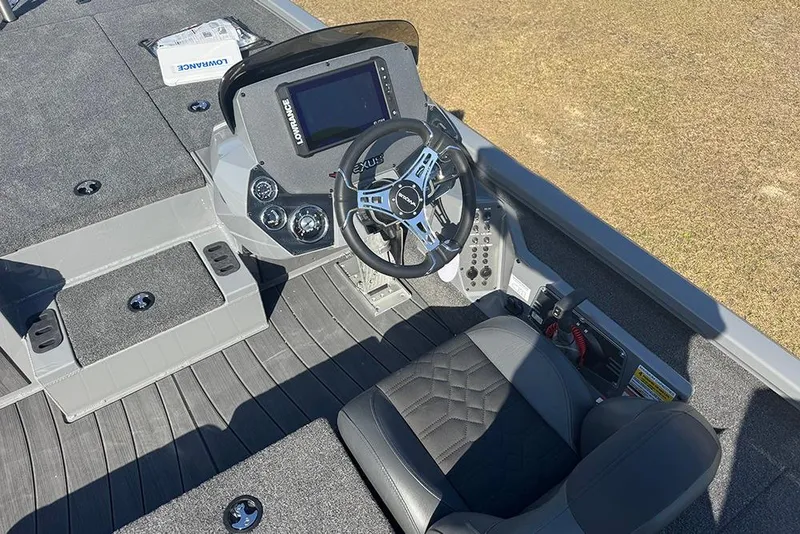 Slide: The Image of 2026 Vexus AVX 2080 boat cockpit with steering wheel and control panel. - 22