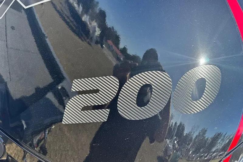 Slide: The Image of Close-up of 2026 Vexus AVX 2080 boat engine with '200' carbon fiber design. - 6