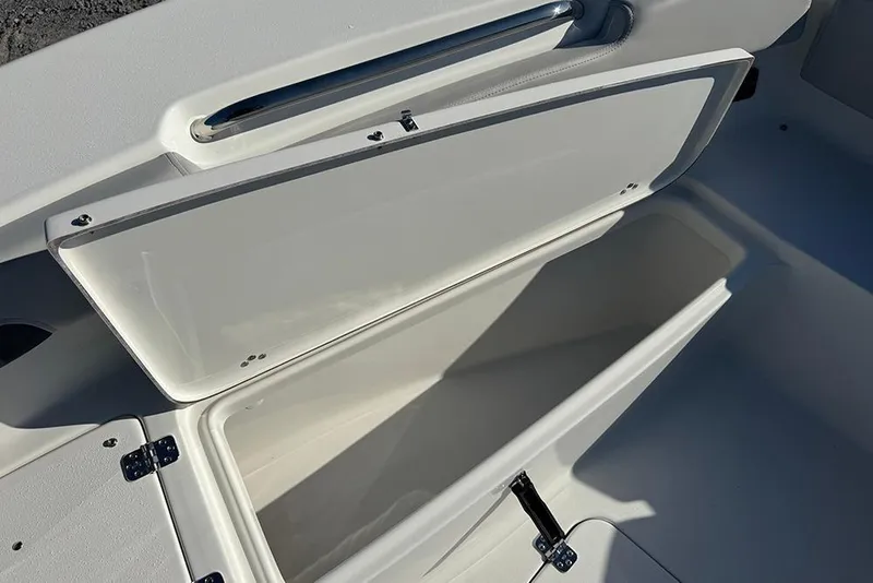 Slide: The Image of Open storage compartment on 2026 Sea Pro 202 Center Console boat. - 12