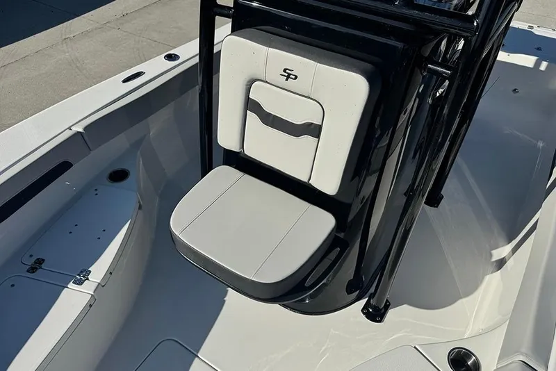 Slide: The Image of 2026 Sea Pro 202 Center Console boat interior with seating and storage compartments. - 19