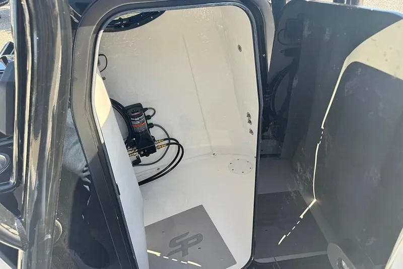 Slide: The Image of Interior view of 2026 Sea Pro 202 Center Console boat, featuring storage compartment. - 24