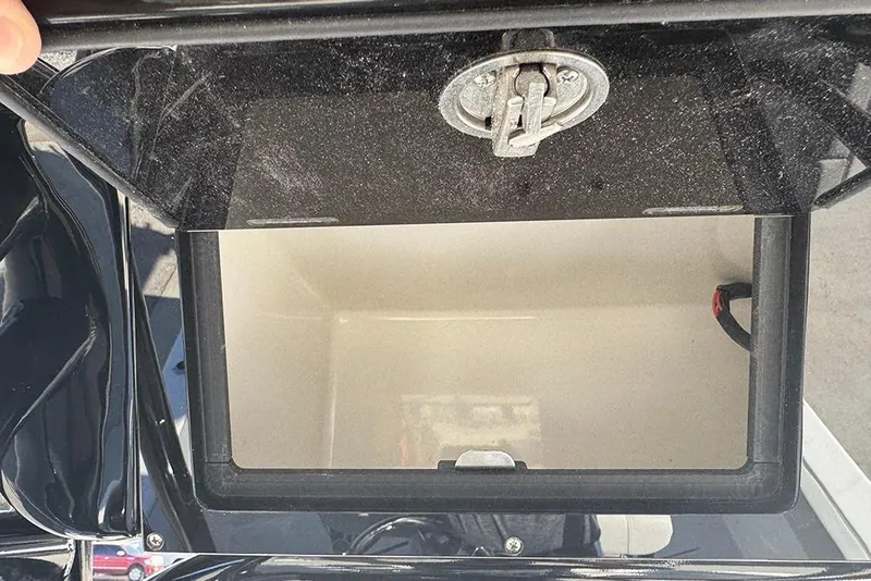 Slide: The Image of Open storage compartment on a 2026 Sea Pro 202 Center Console boat. - 33