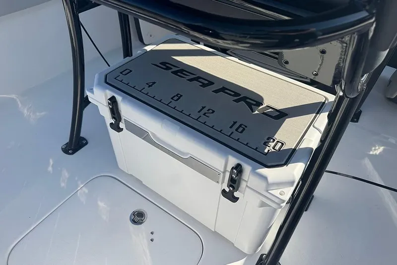 Slide: The Image of 2026 Sea Pro 202 Center Console boat with integrated cooler and measuring pad. - 35
