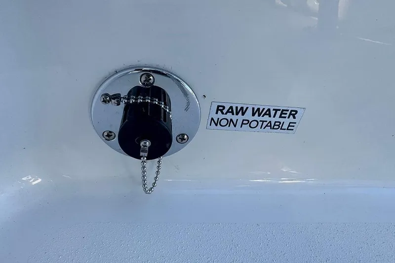Slide: The Image of 2026 Sea Pro 202 Center Console raw water outlet, labeled non-potable. - 38