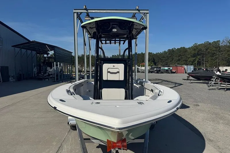 Slide: The Image of 2026 Sea Pro 202 Center Console boat on trailer, outdoor storage area. - 4