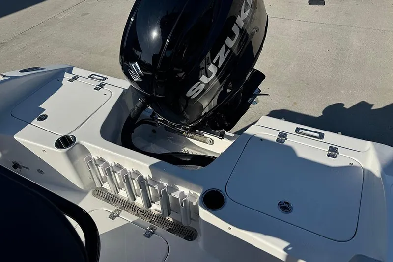 Slide: The Image of 2026 Sea Pro 202 Center Console boat with Suzuki outboard motor, rear deck view. - 40