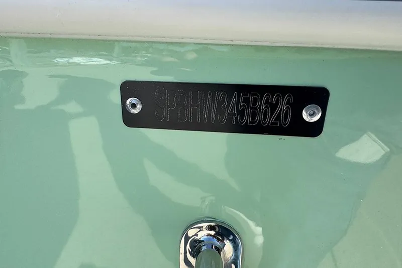 Slide: The Image of 2026 Sea Pro 202 Center Console boat with visible hull identification number. - 48