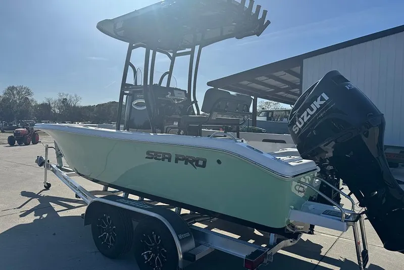 Slide: The Image of 2026 Sea Pro 202 Center Console boat on trailer with Suzuki outboard motor. - 7