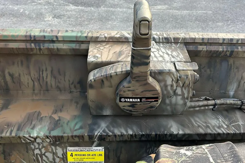 Slide: The Image of Camouflage interior of 2026 G3 Gator Tough 17 SC boat with Yamaha throttle control. - 15