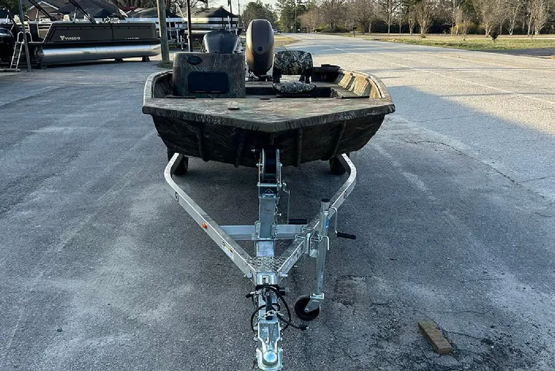 Slide: The Image of 2026 G3 Gator Tough 17 SC boat on trailer, parked outdoors. - 3