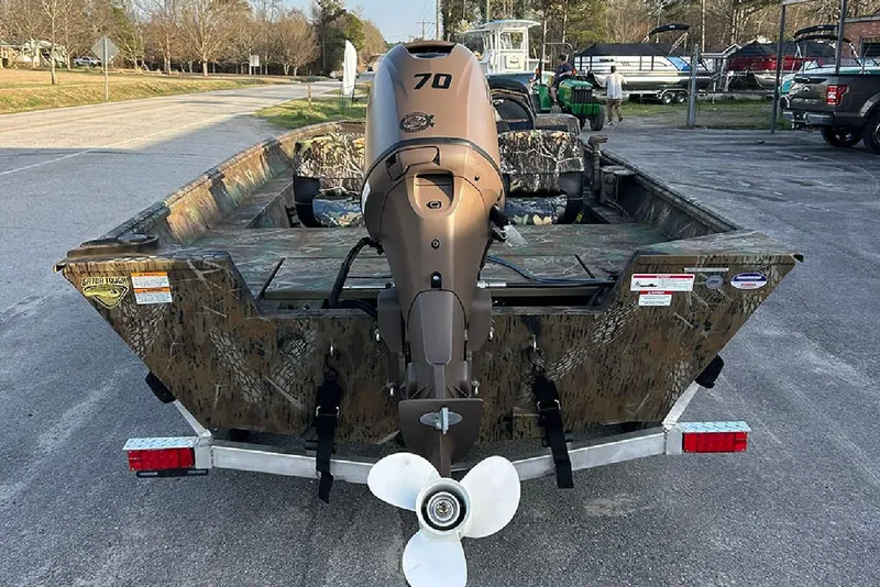Slide: The Image of 2026 G3 Gator Tough 17 SC boat with camouflage design and 70 HP outboard motor. - 6