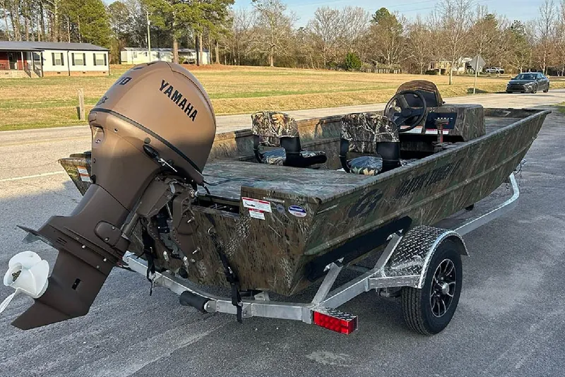 Slide: The Image of 2026 G3 Gator Tough 17 SC boat with Yamaha motor on trailer. - 7