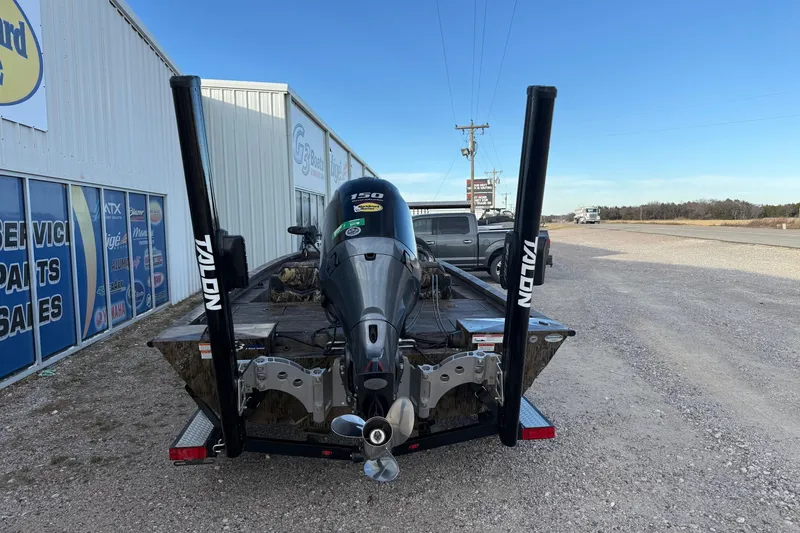 Slide: The Image of 2023 G3 Sportsman 1910 boat with Talon anchors, parked outside dealership. - 4