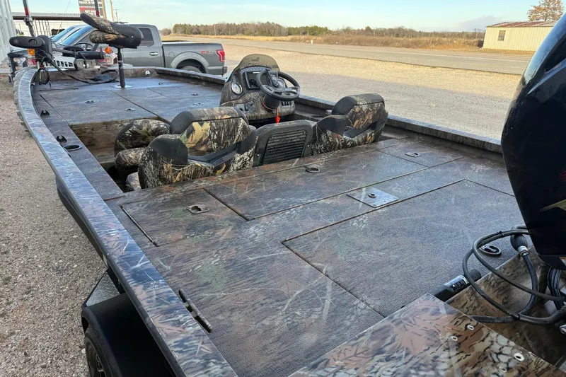 Slide: The Image of 2023 G3 Sportsman 1910 boat with camouflage seats and spacious deck. - 5