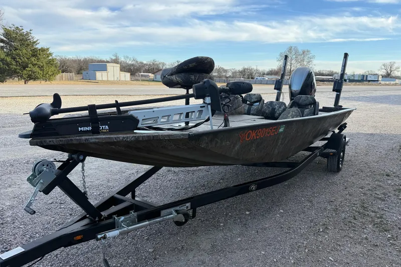 Slide: The Image of 2023 G3 Sportsman 1910 fishing boat on trailer, featuring Minn Kota Ultrex motor. - 6