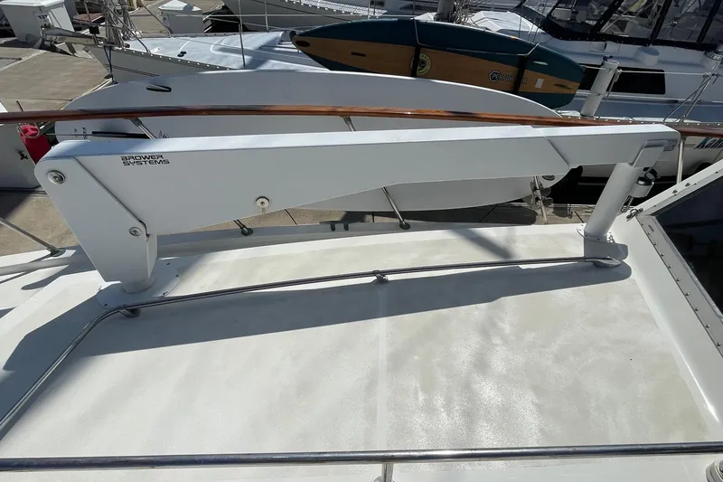 Slide: The Image of 1975 Uniflite Sport Fisher 42 boat deck with Brower Systems davit. - 25