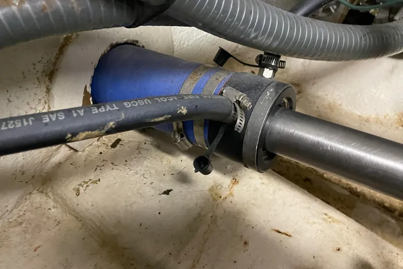 Slide: The Image of 1975 Uniflite Sport Fisher 42 engine compartment with hoses and fittings. - 33