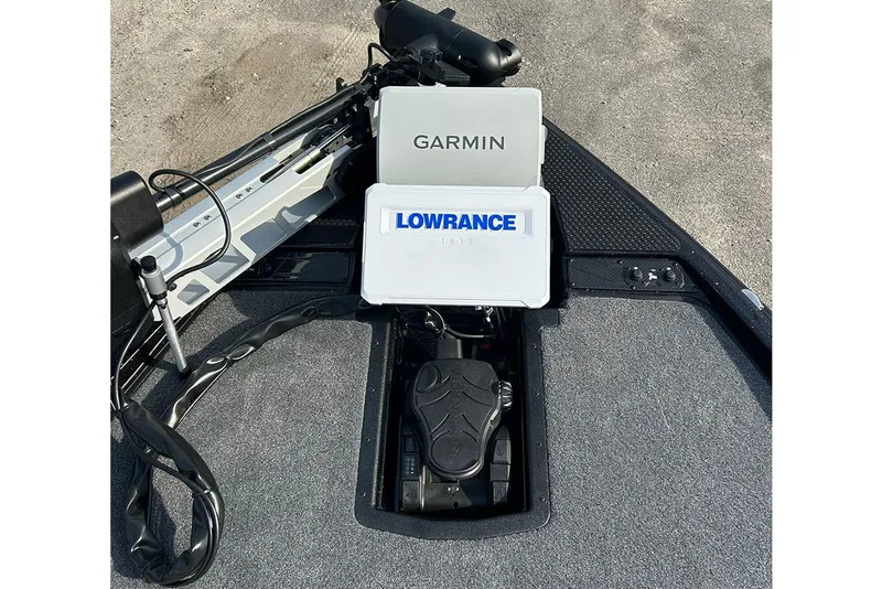 Slide: The Image of 2026 Phoenix 921 Elite X boat with Garmin and Lowrance navigation systems. - 13