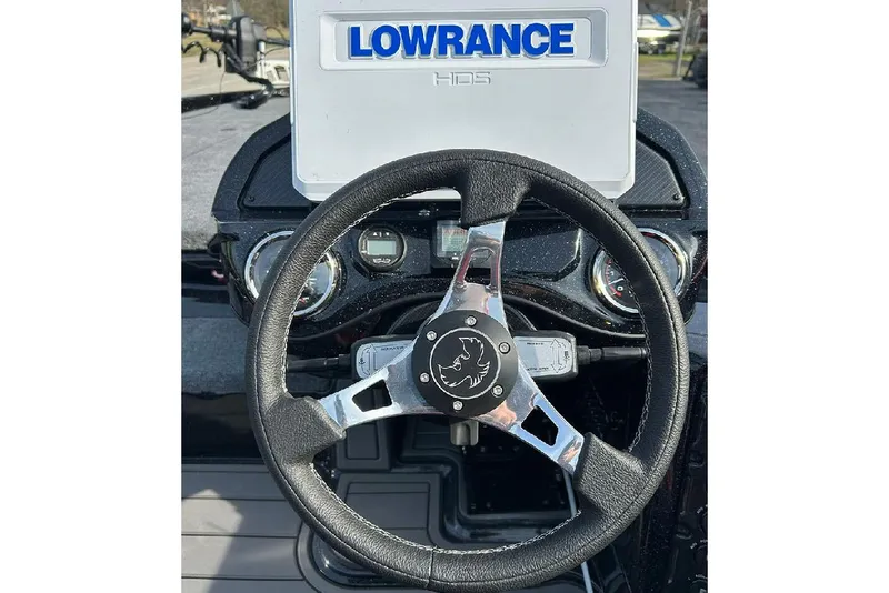 Slide: The Image of Steering wheel of 2026 Phoenix 921 Elite X with Lowrance HDS display. - 19