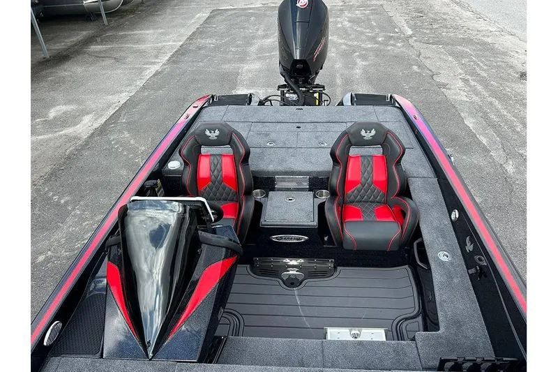 Slide: The Image of 2026 Phoenix 921 Elite X boat interior with red and black seats, sleek design. - 29